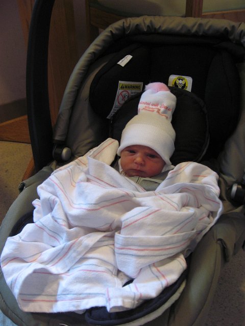 IMG_1799.JPG - Prepped and ready for the trip home.  (Yes, the hospital requires a cap be worn even in 90 degree weather!!)