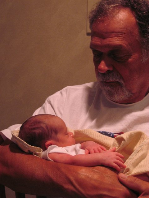 IMG_2053.JPG - Snoozin' under the watchful eye of Grandpop.