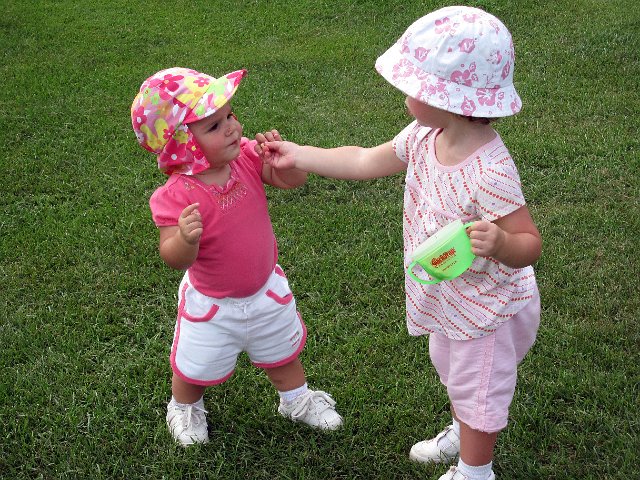 IMG_9569b.jpg - Catherine is learning a lesson on sharing.