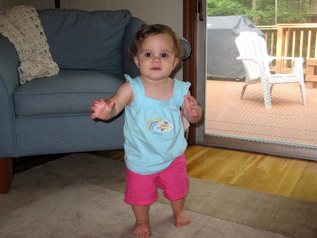 IMG_9091b.jpg - She's taking her first steps!  It's usually about 10 in a row and then plop onto her bum.