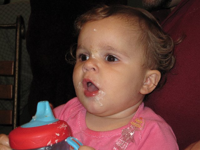 IMG_9422.JPG - She's covered in cake as we celebrated her birthday once again.