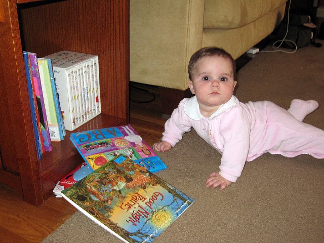 IMG_7546b.jpg - She loves her books .. off the shelf more than on!