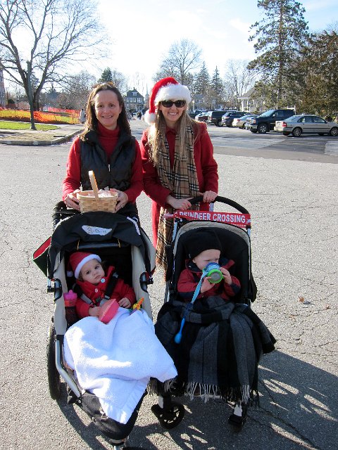 IMG_0595b.jpg - We took part in the Andover Holiday Parade joining The Mother's Connection group in handing out candy, etc.  This is Catherine and I with her playgroup mate, Colby and Mom, Tara.