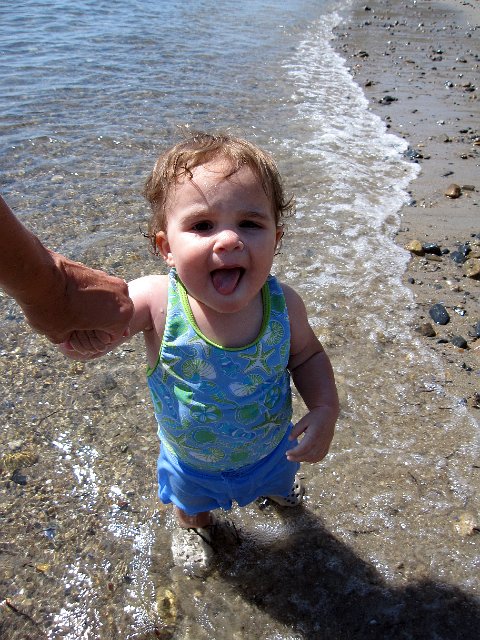 IMG_9706b.jpg - Catherine's first taste of the salty ocean water.  We went to Bevery Lynch Park before meeting Daddy for lunch.