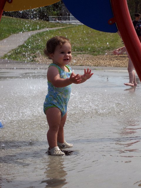 IMG_9728b.jpg - Catherine had a blast while Mom followed her around dodging the sprinklers.