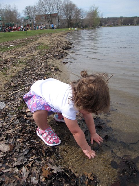 IMG_0632b.jpg - Catherine could care less about the playground behind her, all she wants to play with is the water.