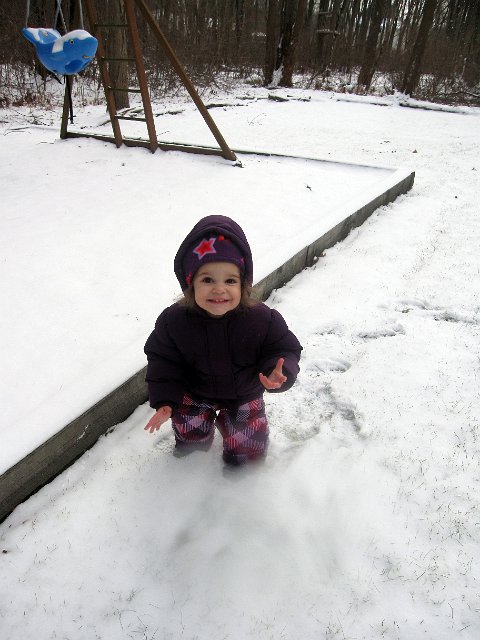 IMG_2250b.jpg - Catherine's already a pro at enjoying the snow, she's just still a little inexperienced with the "mitten thing".