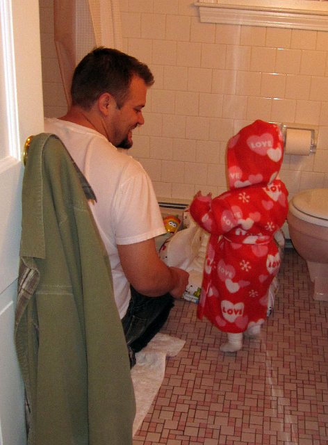 IMG_0001b.jpg - Our little 'Rocky Balboa' on her way to the bathe for her first time in the big person tub.
