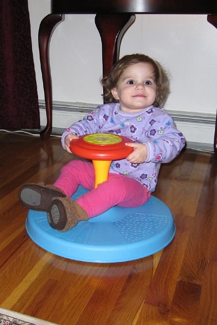 IMG_0807b.jpg - AND, she found time to master one of her Christmas gifts .. the Musical Sit N Spin!!
