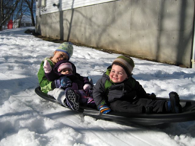 IMG_3205b.jpg - Sledding with the Romboldi kiddos in our side yard.