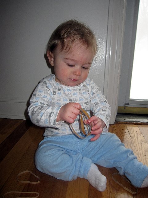 IMG_2758b.jpg - Hmmm, wonder what this does?  He soon found out how rubber bands snap .. oops!