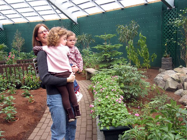 IMG_2934b.jpg - Of course, we are there to see the butterflies, yet the girls were fascinated with the coy pond.  Thanks, Melissa, for holding them up to see the goldfish.