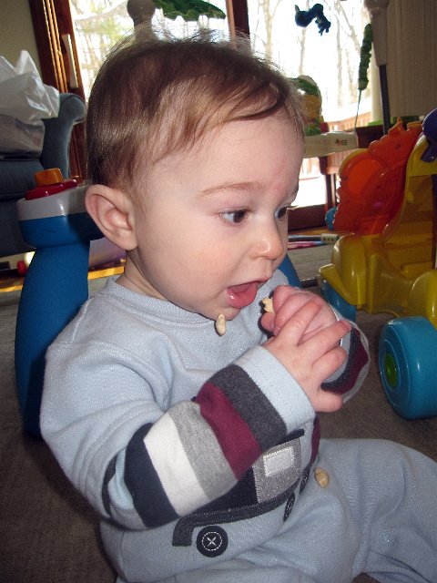 IMG_2636b.jpg - Nathan is giving "puffs" a first try.