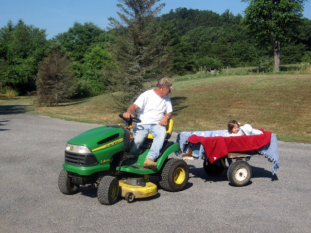 IMG_4542b.jpg - A farm trip wouldn't be complete without a tractor ride.  Kirra & Nathan are holding on in the little wagon.