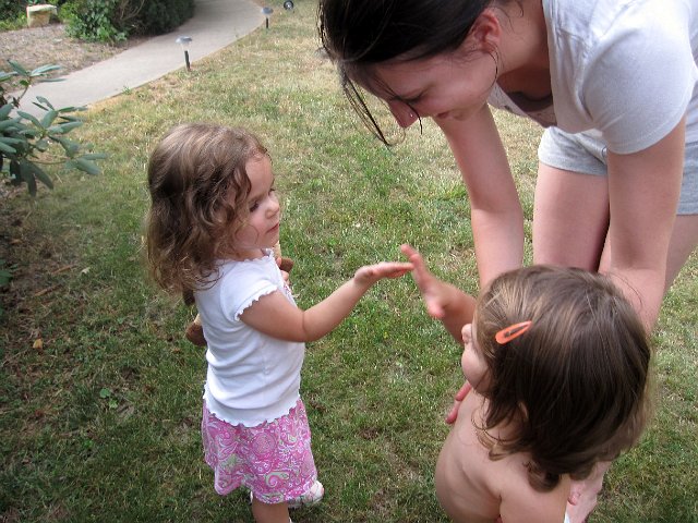 IMG_4987b.jpg - Already time to say goodbye with a casual high five and fist bump between cousins.