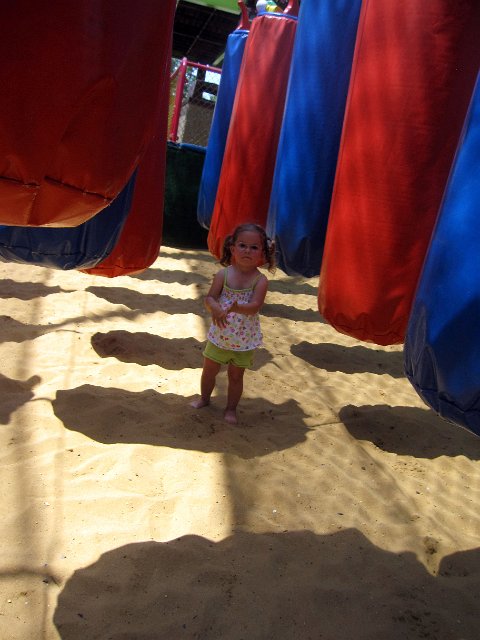 IMG_5226b.jpg - Catherine among the many punching bags in "Monster Maze".