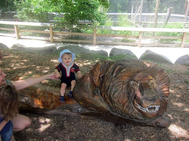 IMG_3473b.jpg - Nathan hanging out with a very tame and friendly king of the beasts.