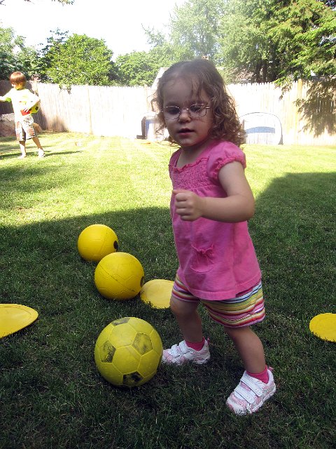 IMG_4333b.jpg - Catherine playing games with Coach Michelle and the kids.