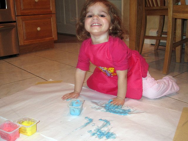IMG_3303b.jpg - We tried finger painting (with colored yogurt, just in case she tried to eat it).