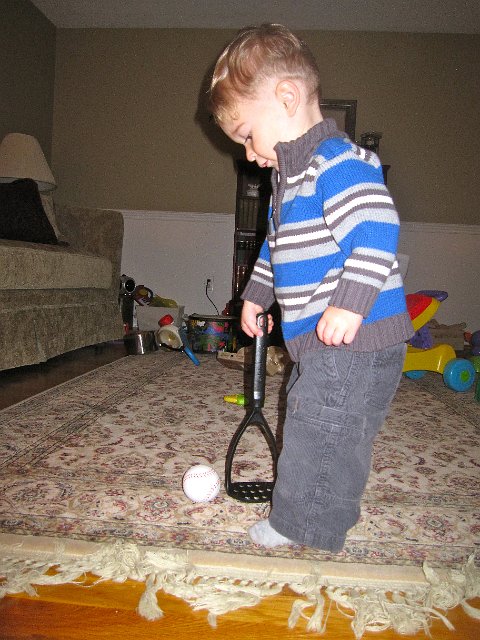 IMG_6730.jpg - You teach him how to play mini golf just once, weeks ago, and look at what he put together ... using a potato masher from the top drawer!!!