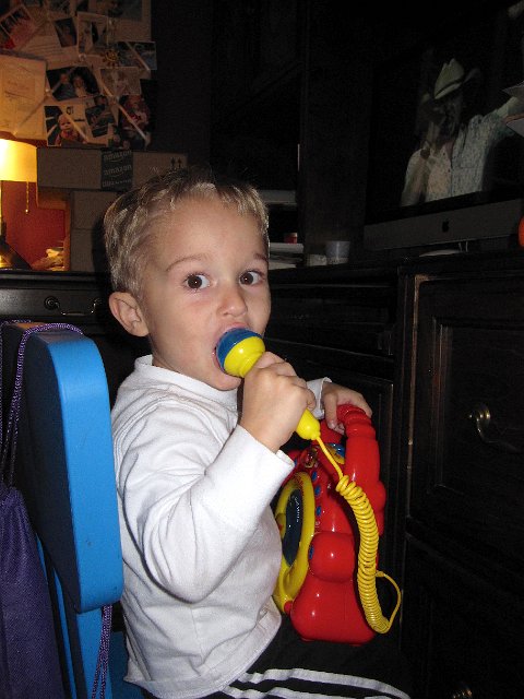 IMG_3200.jpg - Nathan is our little country guy (you adapt to what you are exposed to I guess).  He grabbed his microphone when catching a Jason Aldean video on the computer.
