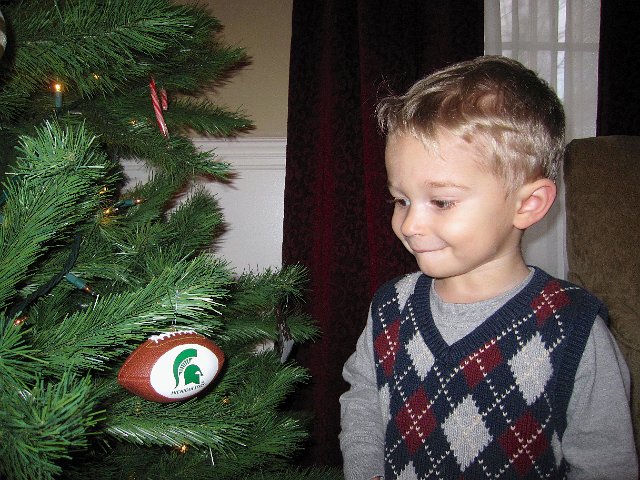IMG_3241.jpg - Of course, he also raced to get to the MSU football ornament too.