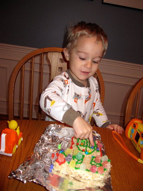 IMG_3516.jpg - I didn't think we were quite ready for the real gingerbread houses, so we're taking a baby step towards that goal with krispie houses.
