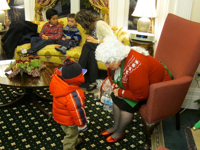 IMG_6049.jpg - We attended the Andover Holiday Happenings this year.  We started off the night trying to catch up with Santa and the gang at a local bank.