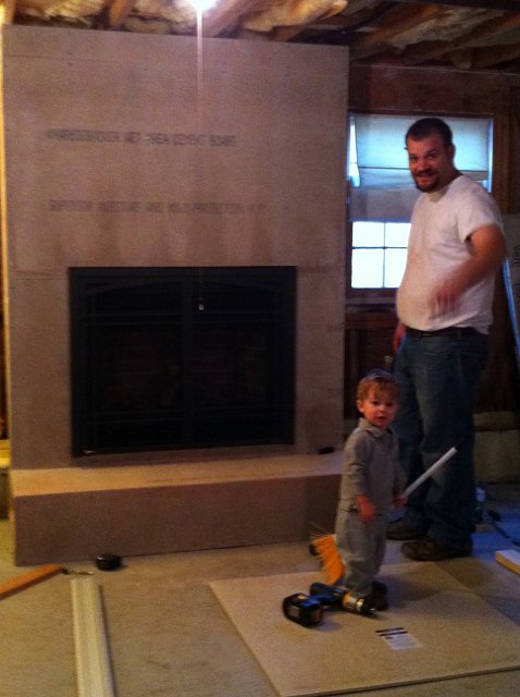 IMG_1877.jpg - Progress on the basement fireplace and Dad's little helper is never far from his side ...