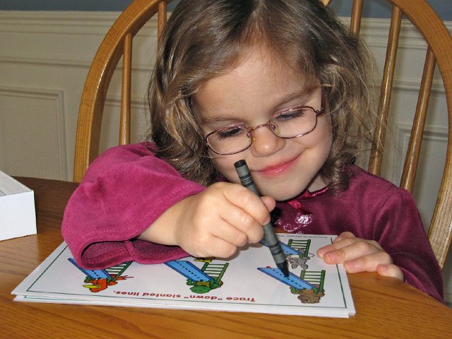 IMG_8015.jpg - Catherine taking some time today to practice writing (instead of napping).