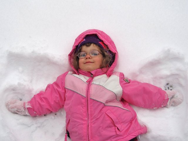 IMG_8029.jpg - The snow was too light for snowman building, so our little angel made some snow angel friends.
