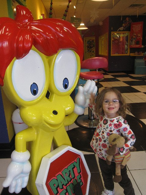 IMG_8072.jpg - Catherine was very excited for her first haircut and giving high-fives to Mr. Snip-its.