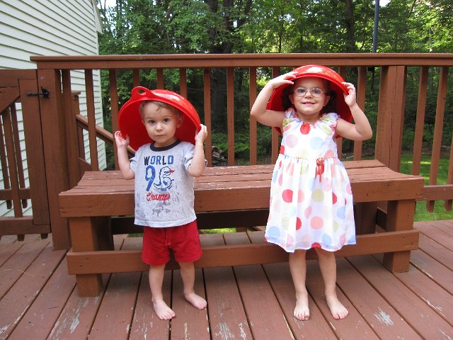 IMG_0418.jpg - You never need a lot of props to keep these kids happily entertained.