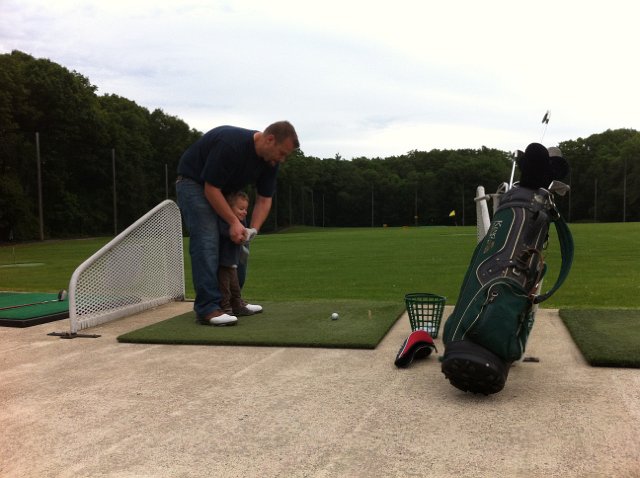 IMG_2192.jpg - Daddy needed some practice time before his annual golf tournament and the kids wanted to play too.