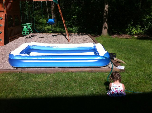 IMG_2267.jpg - Meanwhile, on the home front .. we have outgrown the baby pool and upgraded to a pool that they could both play in at the same time.  Catherine is anxiously awaiting its completion.