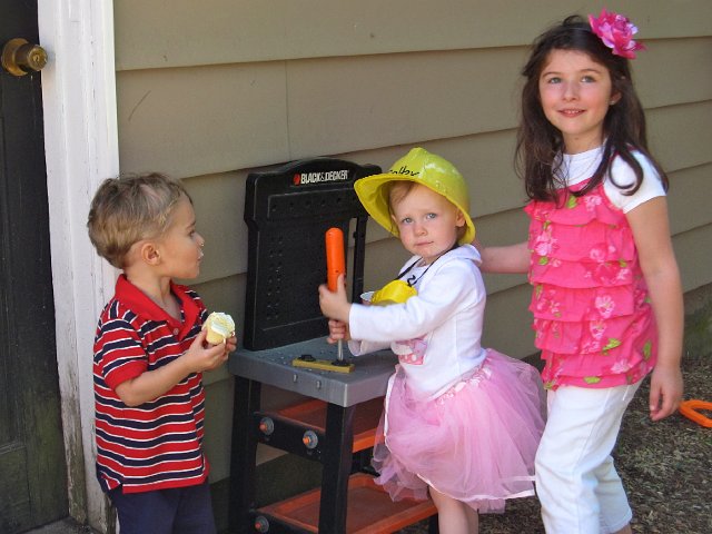 IMG_9657.jpg - Nathan hanging with the birthday girl (and her cousin, Elizabeth) by the work bench.