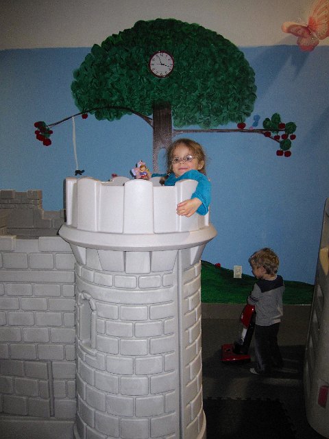 IMG_2891.jpg - There they are, "Rapunzel" and Nathan who can't stop it with the vacuuming.