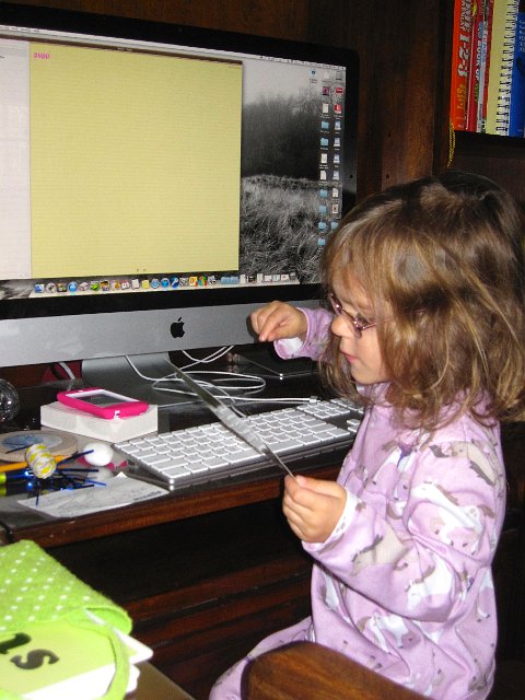 IMG_2924.jpg - Here Catherine is practicing her keyboarding skills and spelling words.