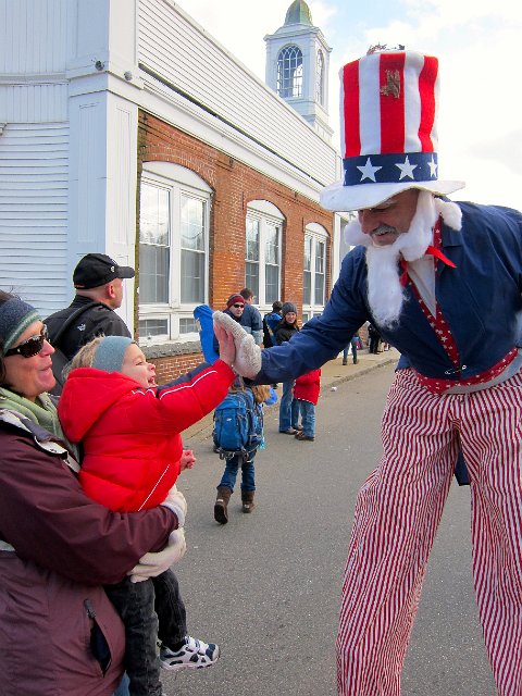 IMG_5893.jpg - Thank goodness, there was actually a man on stilts that he got to meet following the parade.