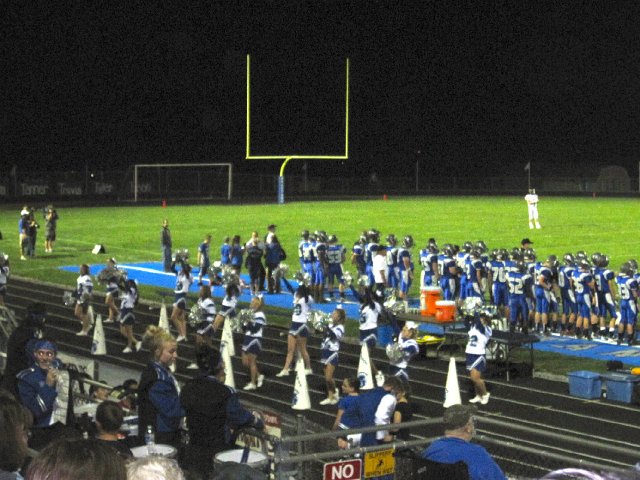 IMG_2278.jpg - They both enjoyed the marching band and the cheering of the crowd for the undefeated 2012 Spartans!