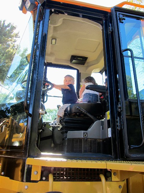 IMG_5367.jpg - And, we can't seem to passby an opportunity to climb in any big construction vehicle!