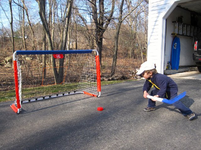 IMG_4791.jpg - If it's above 50 degrees and sunny, outside we will go!  Nathan is going in for the goal!!