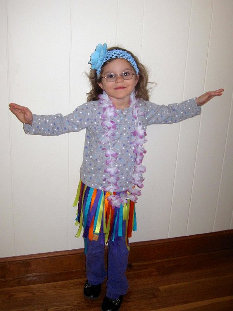IMG_5283.jpg - I think she was inspired by her Hello Kitty coloring book (Hello Kitty was wearing a grass skirt) and Catie Ann suddenly had an urge to learn more about Hawaii.