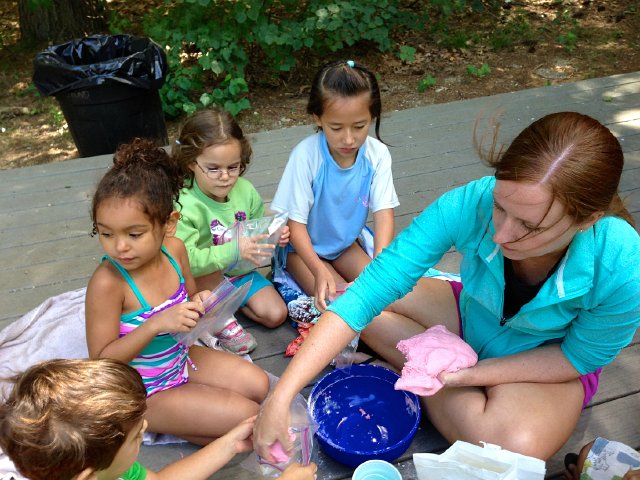 IMG_3966.jpg - Catherine and her pink homemade PlayDoh at Beach Buddies.  (She cried during the 2nd day during pickup because she wanted to stay longer ... I guess we'll be looking at this program again next year.)