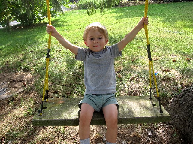 IMG_7557.jpg - Nathan stretching to hold on for this big swing.