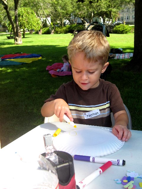IMG_7624.jpg - He made his very own musical instrument, played some soccer, completed an obstacle course and a craft.