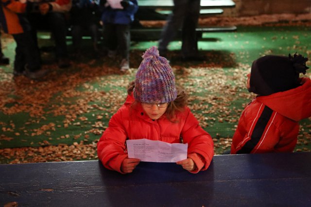IMG_0314.jpg - Next item on the agenda for the evening is caroling.  Catherine loves the fact that she can read and learn all the words correctly now.