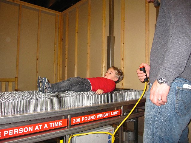 IMG_4104.jpg - Hmmm, a bed of nails.  Not exactly something I wanted to check out, but the kids did.