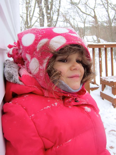 IMG_6663.jpg - Precious girl patiently awaiting an igloo being built on the deck.