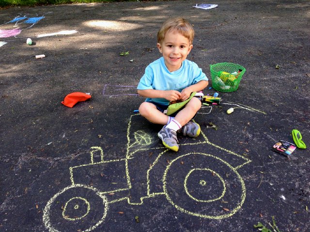 IMG_3552.jpg - Nathan and his tractor.